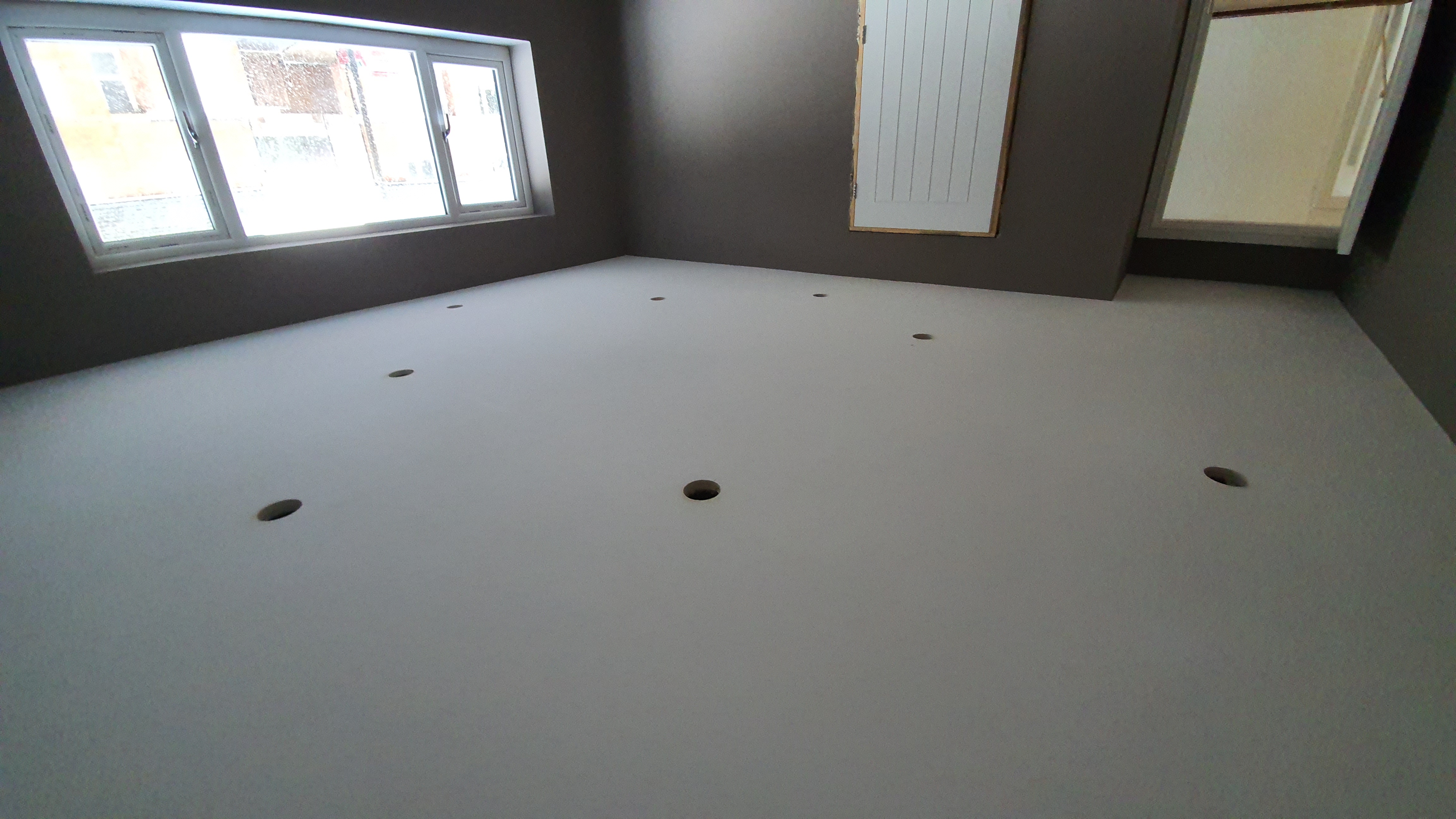 Downlight installation in progress